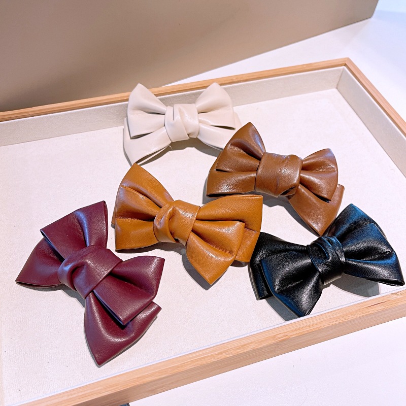 New Style Autumn And Winter French Retro Pu Leather Bow Hairpin Hairpin Temperament Hair Accessories Bangs Clip Hair Accessories display picture 2