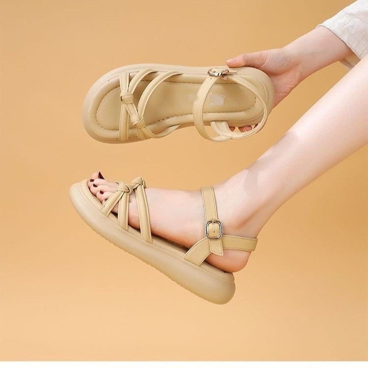 Sandalias de fondo plano para mujeres verano 2026 nuevo estilo de ropa exterior antideslizante casual de moda versátil con base suave no cansado sandalias de pie para mujeres