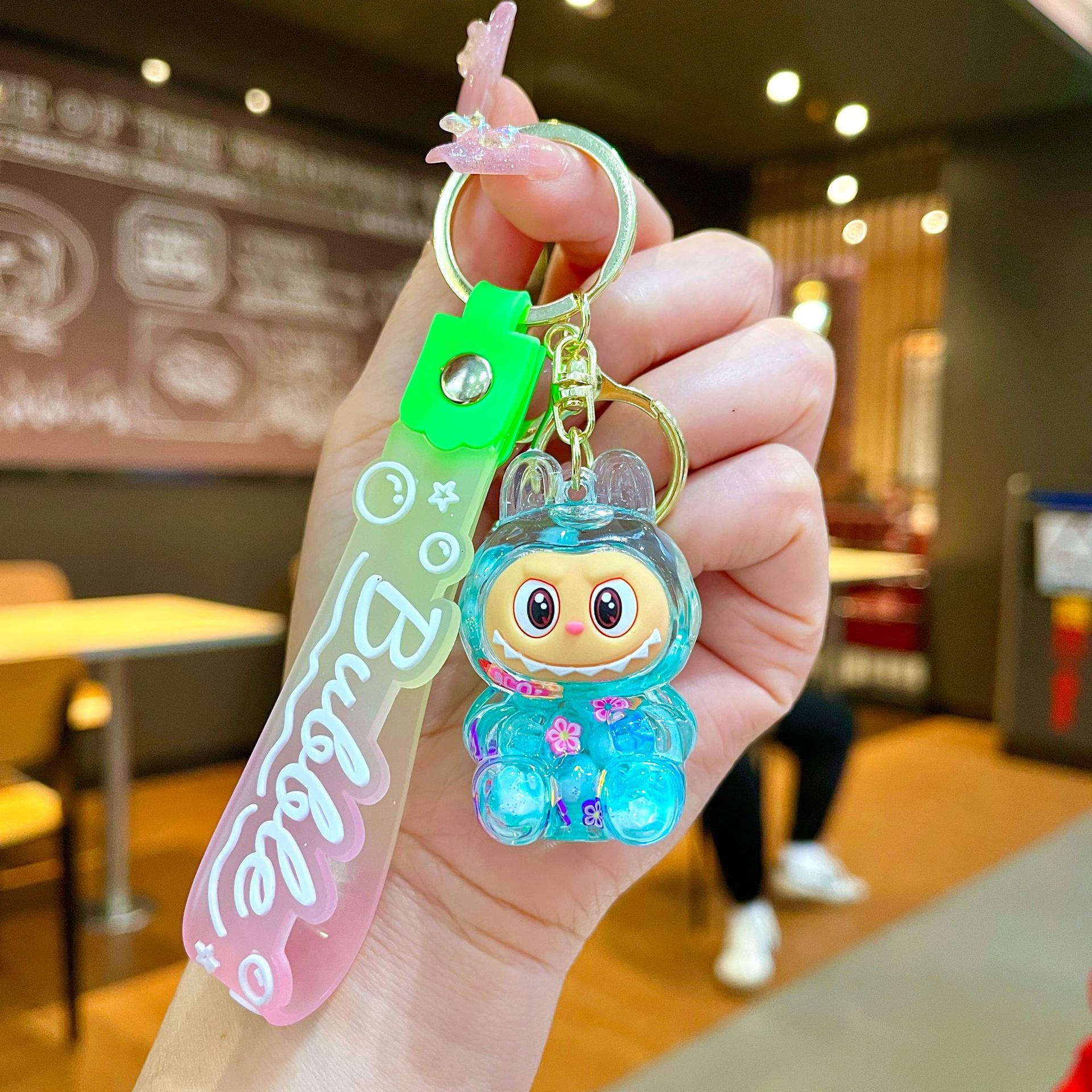 Llavero red acrílico con arena flotante