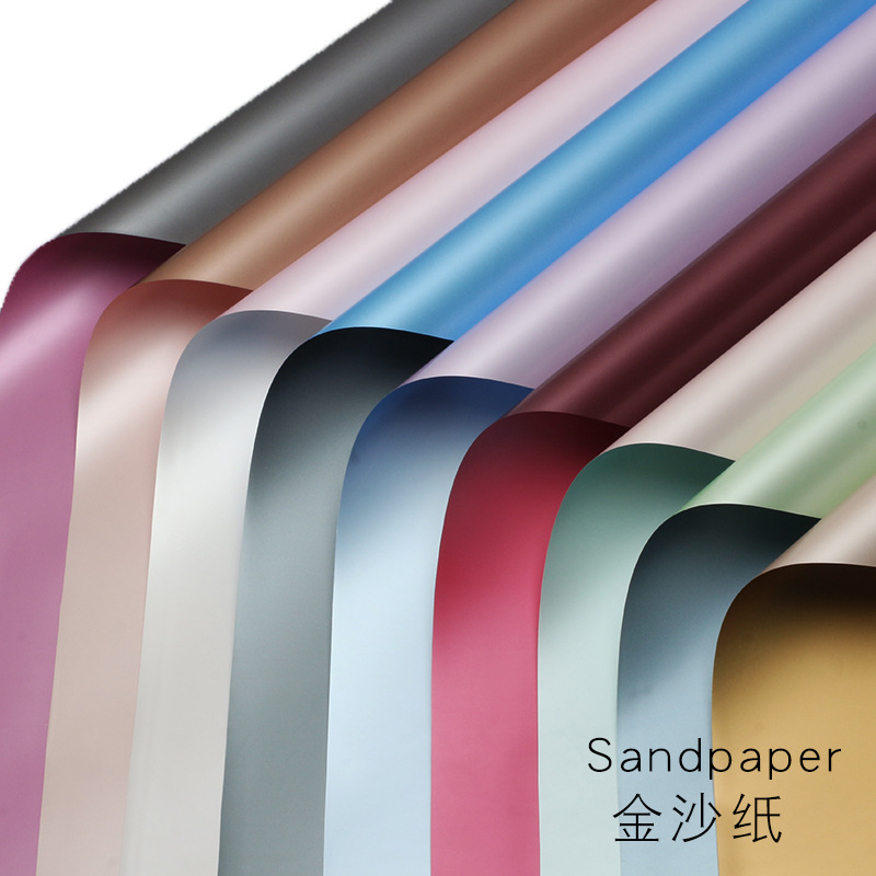 Huaxi papel de arena de oro flor papel de embalaje de papel mate de dos colores al por mayor ramo de regalo de papel de embalaje de materiales de viento fragante