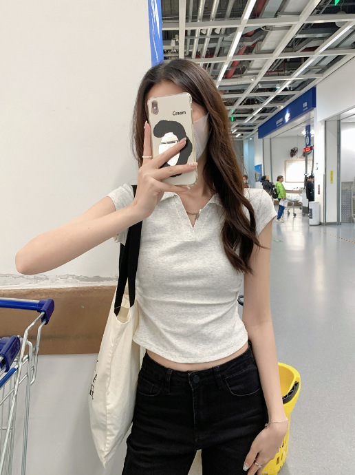 ギャルは腰のtシャツの半袖の女性の純欲の夏の2025新型の純色の女性の丸首の底のシャツの卸売りを収めます。|undefined