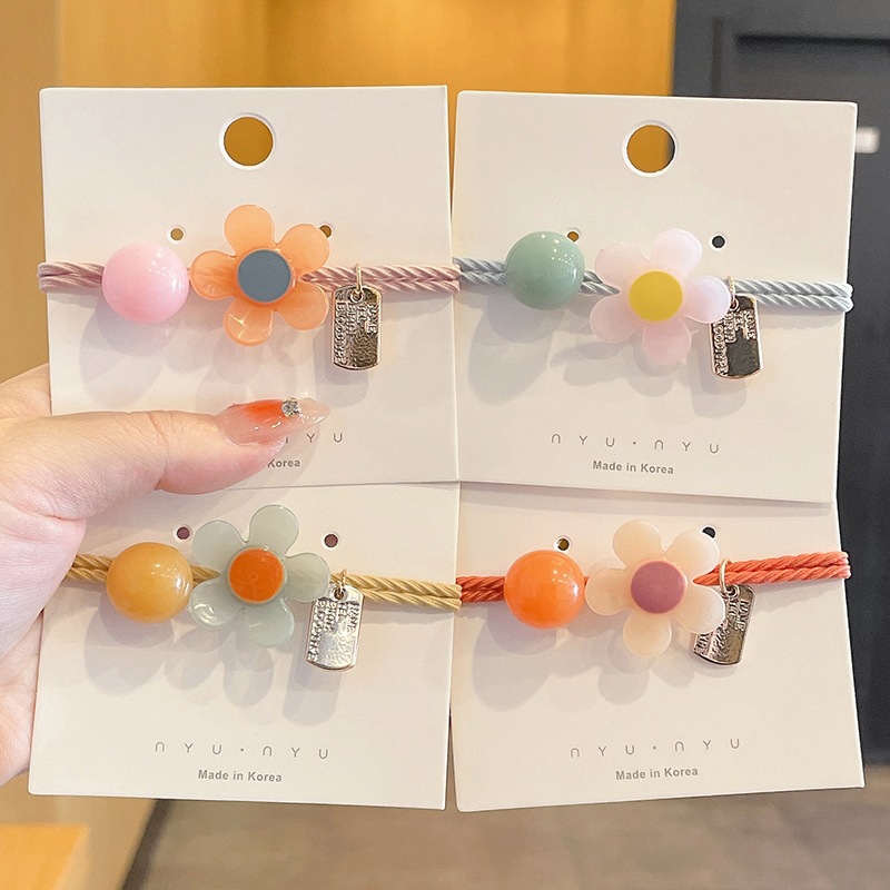 Japonés y coreano Super Hada red cabeza roja cuerda flor redonda banda de goma simple todo-fósforo de la moda de alta apariencia linda chica horquilla