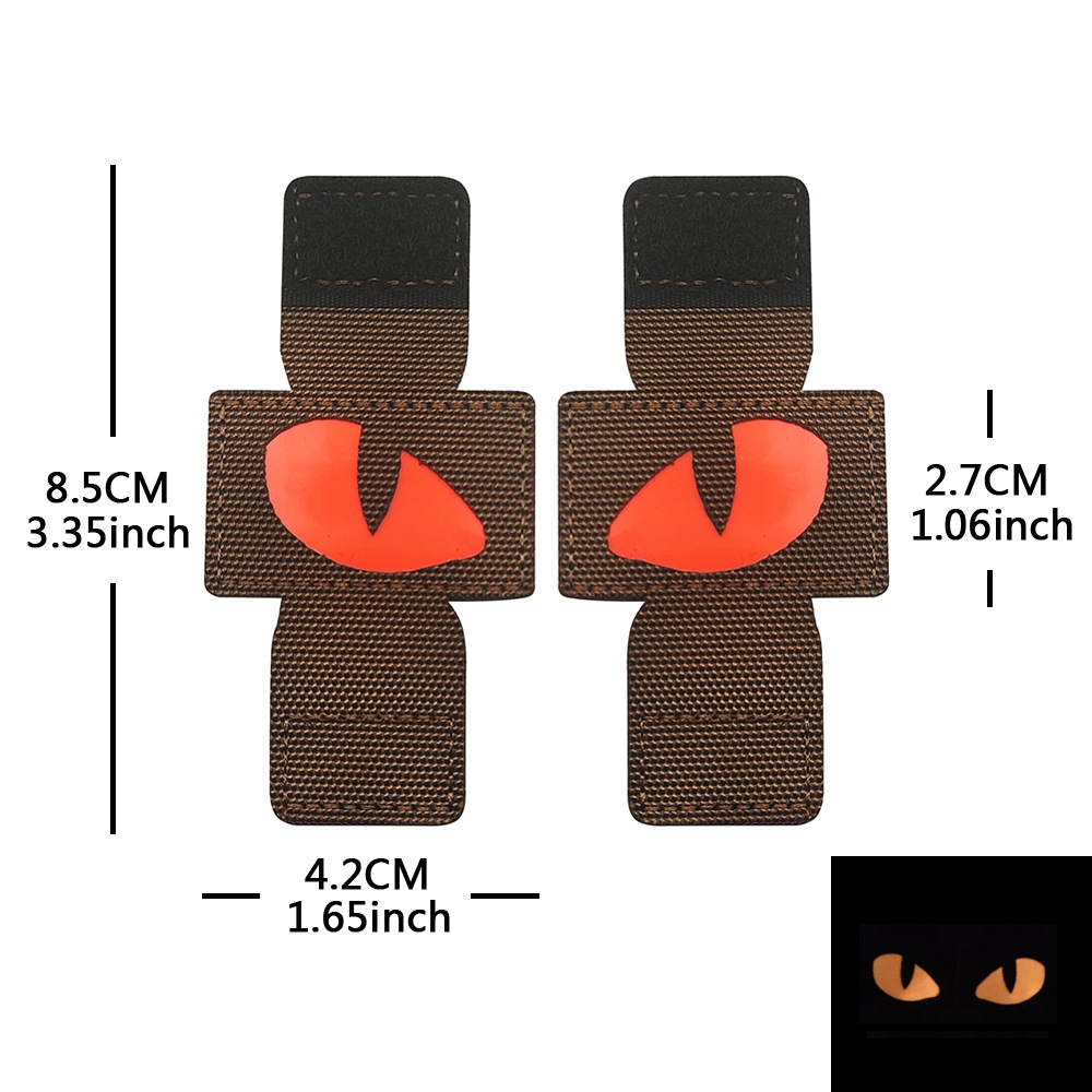Creativo suministro personalizado gato ojo luminoso moral sello al aire libre militar fan mochila sello pequeño diablo militar MOLLE colgante