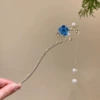 Blue pendant, golden Chinese hairpin