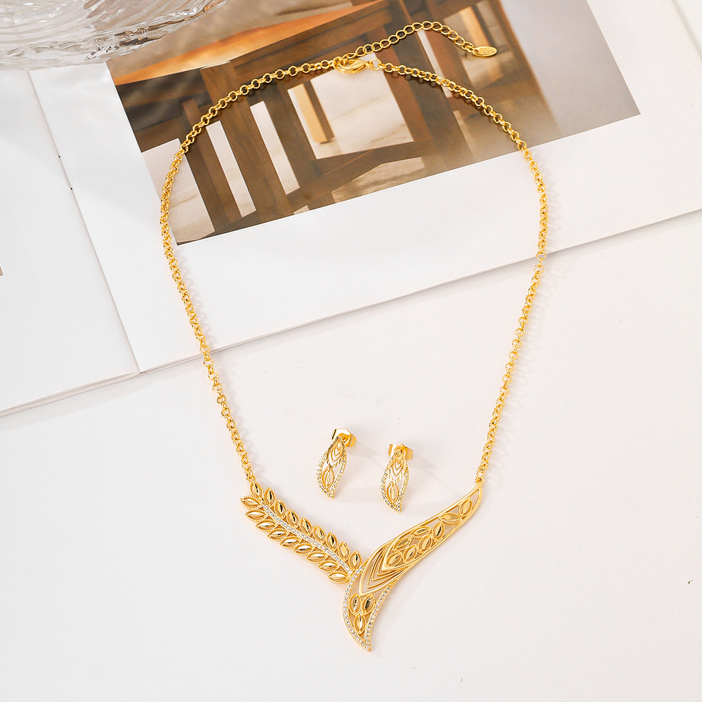 Joyas populares transfronterizas del Medio Oriente, aretes de moda, collares, pernos de piedra de bronce, dos piezas, joyas