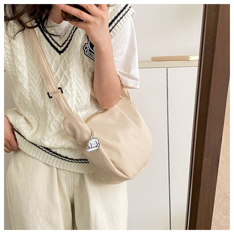 Large capacity canvas shoulder for women in spring summer 2023, new solid color, simple and fashionable casual bag,_voghion.com