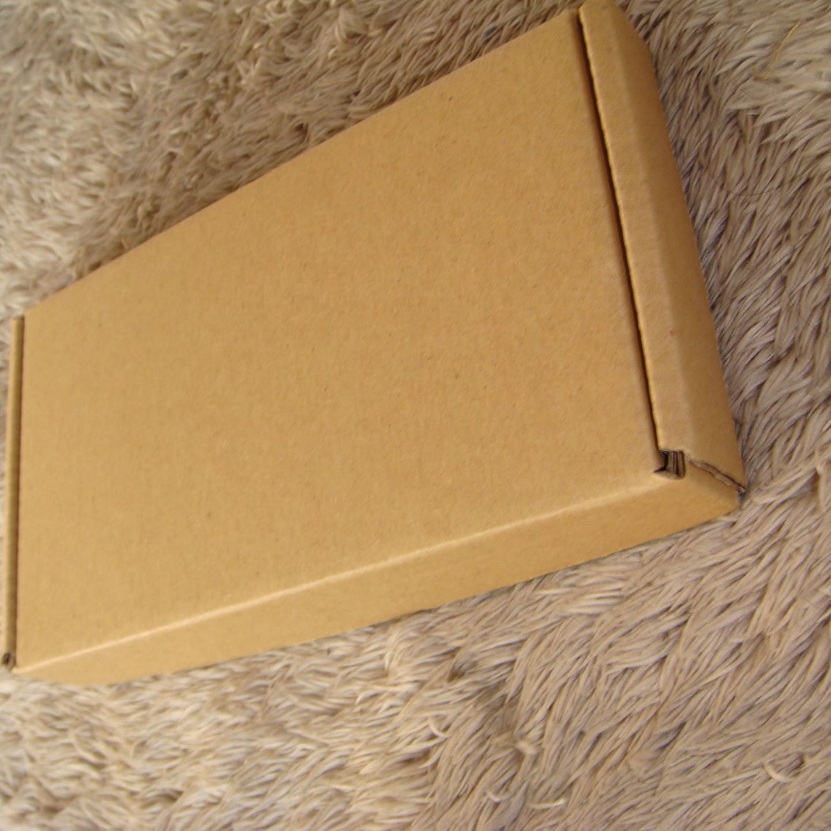 Suministro directo de fábrica accesorios caja de joyería teléfono móvil caja de embalaje cuadrado cartón caja de avión pequeño