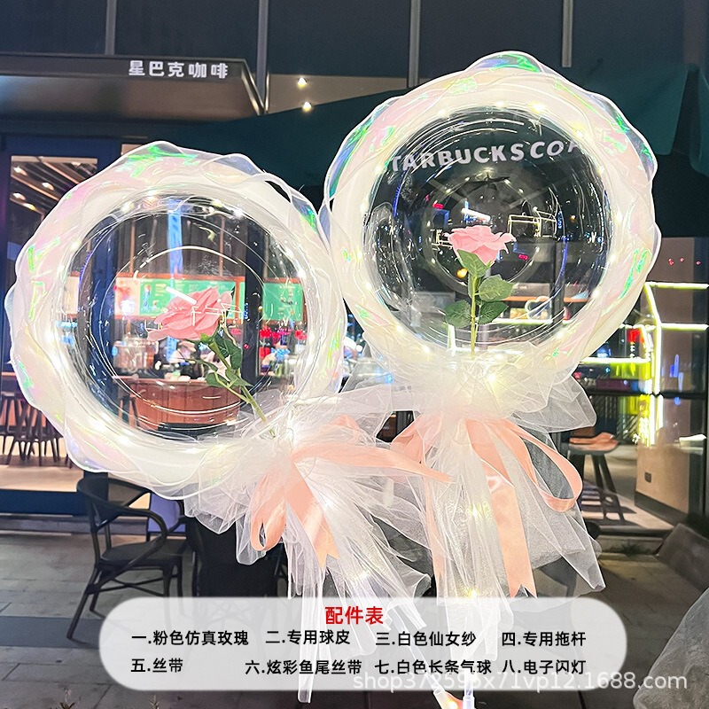 光る夜市の円形の赤い屋台のネットを並べてボールを押して会の風船のイルミネーションの明かりの告白のロマンチックな波の地帯のスーツを押します。|undefined