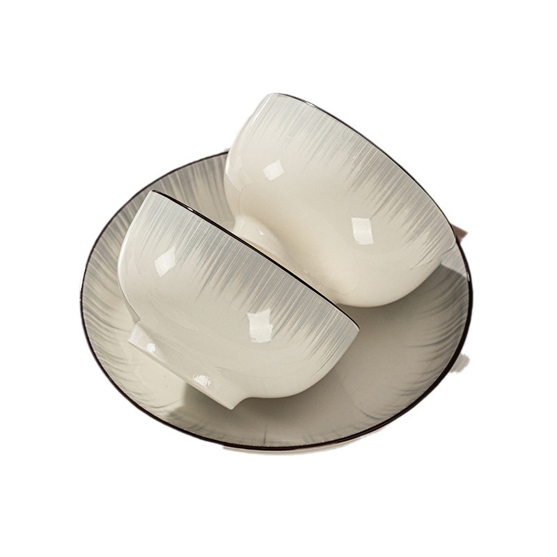 Conjunto de platos esmaltados coloridos cubiertos de cerámica Jingdezhen ligeros cubiertos de cerámica gris de lujo cubiertos de cerámica domésticos cubiertos de platos cubiertos palillos