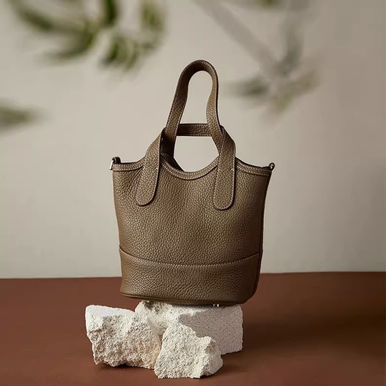 Borsa a secchiello in vera pelle blu pendente NINA/Enya dello stesso stile di Zhu Zhu 2024, borsa a tracolla con tracolla singola_voghion.com