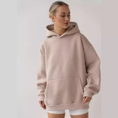 アマゾンクロスボーダーヨーロッパとアメリカの服無地長袖ポケットフード付きプルオーバースウェットシャツ女性のルーズカジュアルスウェットシャツ