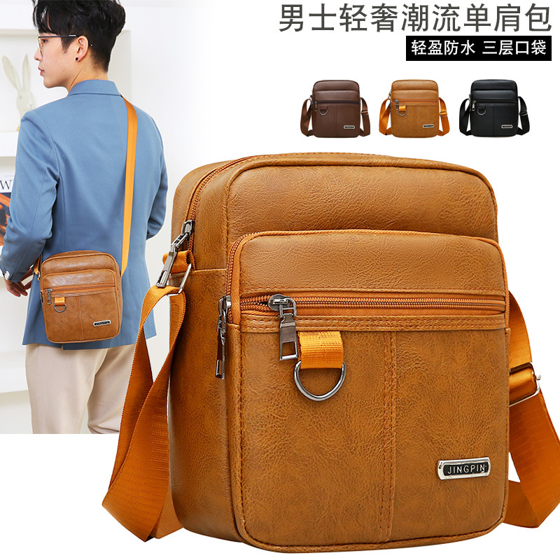 Bolso de los hombres bolso de mensajero ocasional del hombro del negocio partido de la moda vertical japonés y coreano nuevo bolso de los hombres mochila pequeña fábrica al por mayor