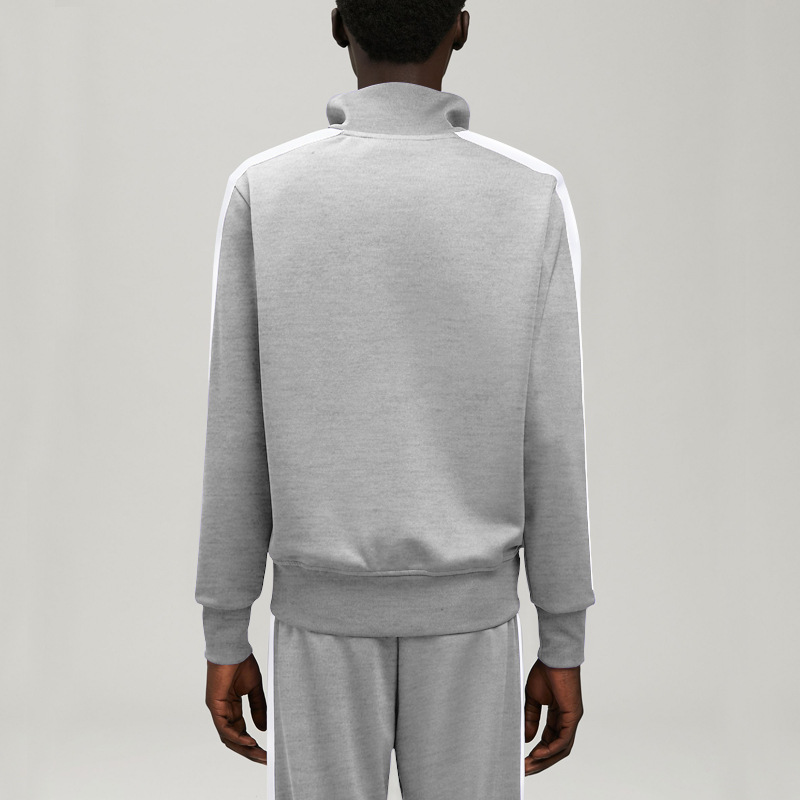 Nuevo otoño y invierno transfronterizos de Europa y Estados Unidos nuevo traje casual de hombre moda de color de collar de collar de juego juvenil traje deportivo para hombre