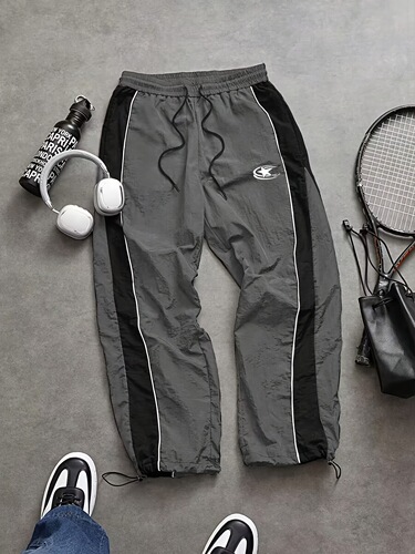 European and American men's side stitching drawstring quick-drying casual pants autumn and summer outdoor sports mountaineering loose assault pants printed