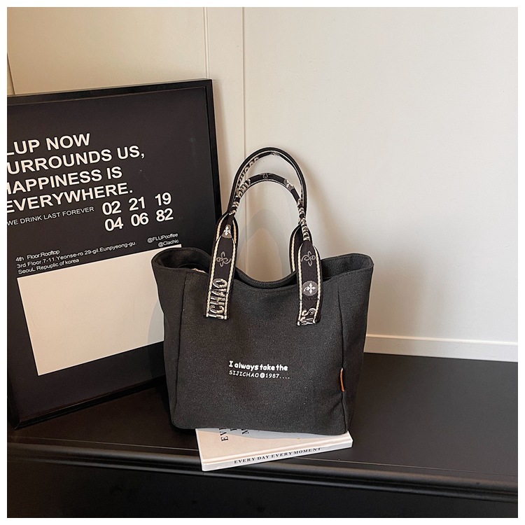 Bolso de lona de gran capacidad para mujeres 2026 verano nuevo bolso de mano ligero y simple para viajar bolso de ocio bolso de mamá