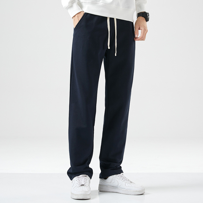 Durable men's trousers for spring and autumn work, plus size, loose fit, affordable, non-magnetic, iron-free casual long trousers.
