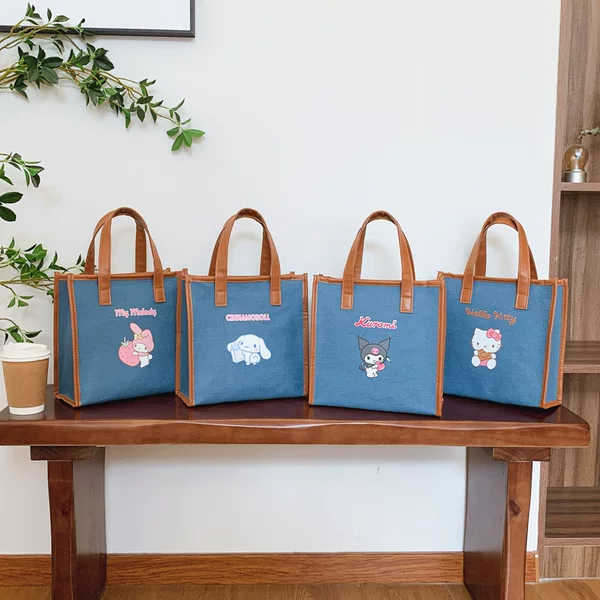 Genuine Authorized Sanrio Cute Denim Large Capacity Portable Cosmetic Bag Japanese Portable Lunch Box Bag Commuter Women