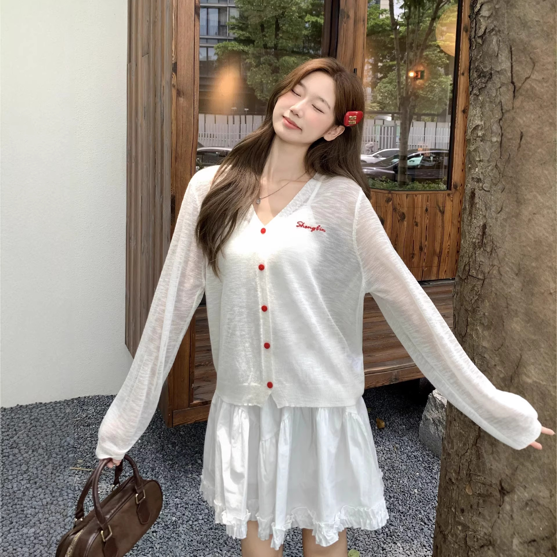 2127# Slightly see-through embroidered single-breasted cardigan for…