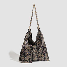 慵懒风印花链条托特包女式2025新款潮大容量上班通勤单肩帆布包女