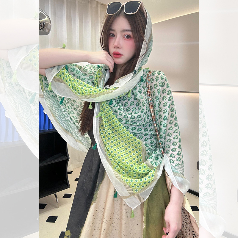 Chal de protección solar de verano para mujer 2025 nuevo estilo hebilla largo estilo étnico fotografía de viaje estilo fino playa bufanda de seda capa