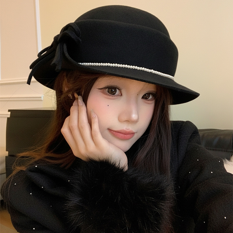 Hepburn estilo elegante sombrero de lana de invierno mujeres temperamento alto sentido sombrero de pescador de punto caliente sombrero de oro universal