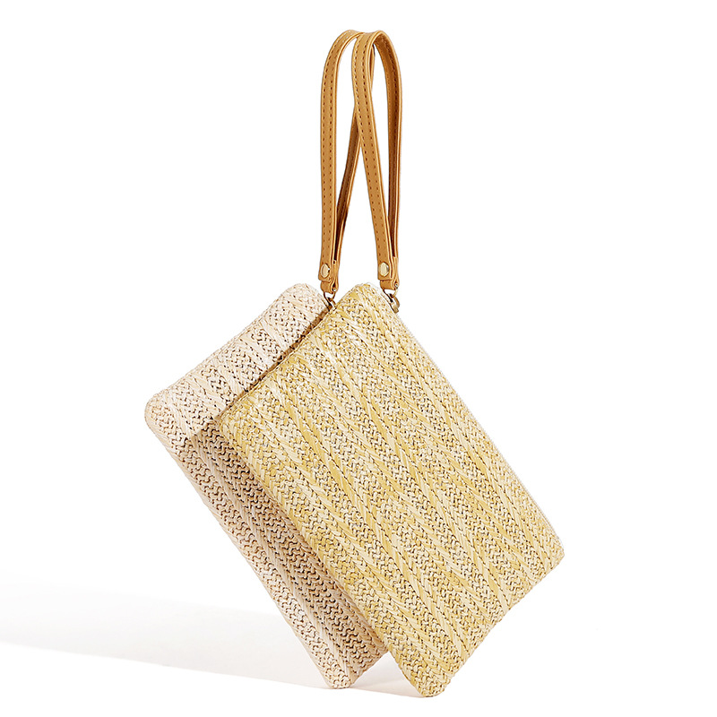 Bolsa de ombro em rattan trançado com acabamento em couro_voghion.com