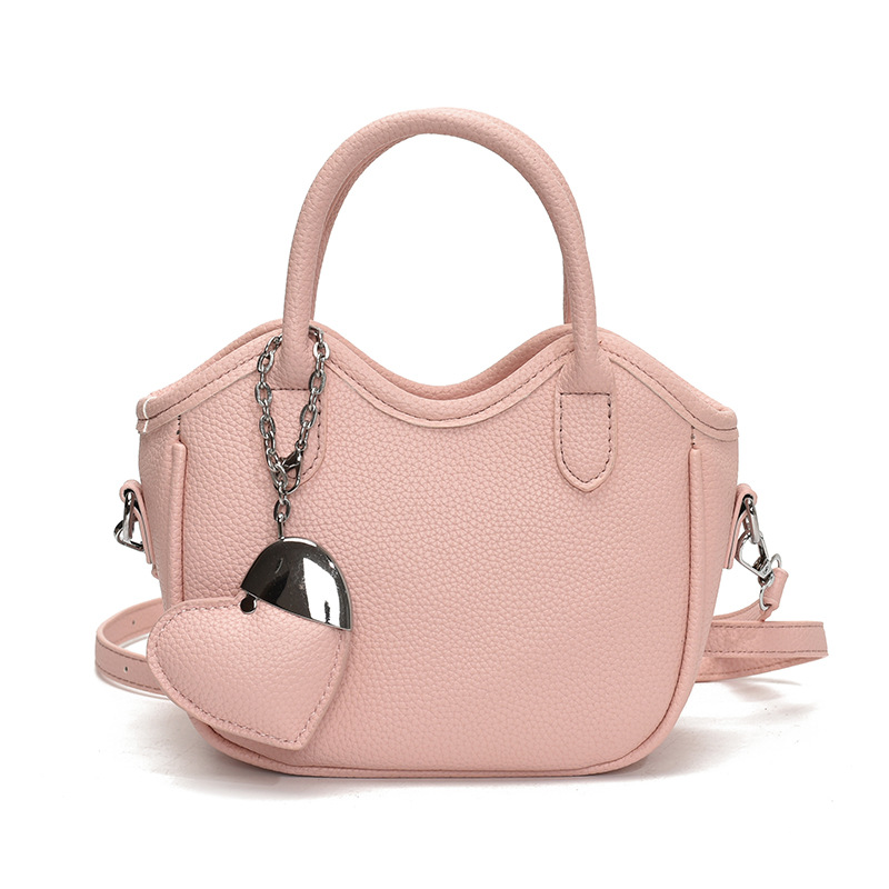 Bolsos pequeños de moda súper calientes de nicho para mujer 2025 nueva tendencia bolsa de cubo de aire extranjero estilo caliente de verano bolso de hombro de mano