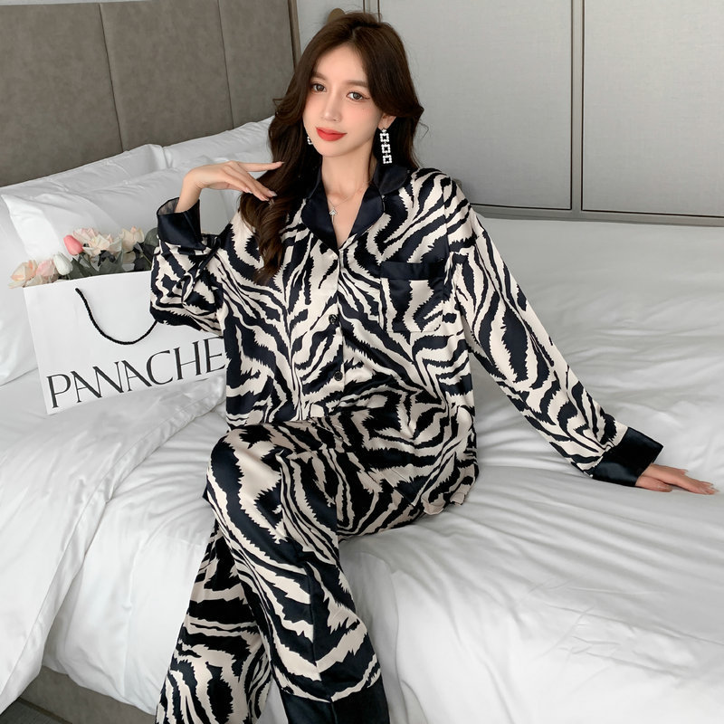 Pijamas de primavera y otoño nuevos pijamas rojos en línea populares patrón de cebra pantalones de manga larga coreano de dos piezas de desgaste para el hogar fábrica al por mayor