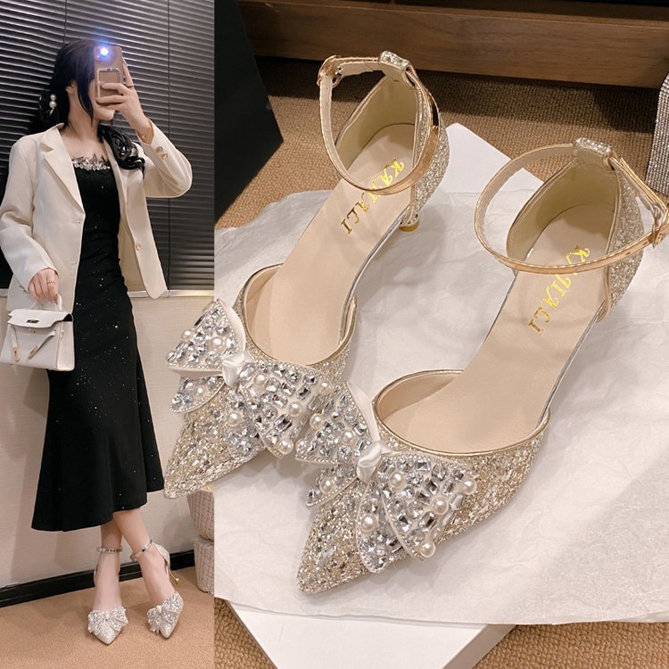 Fashionable high heels with bow for bride with a strap