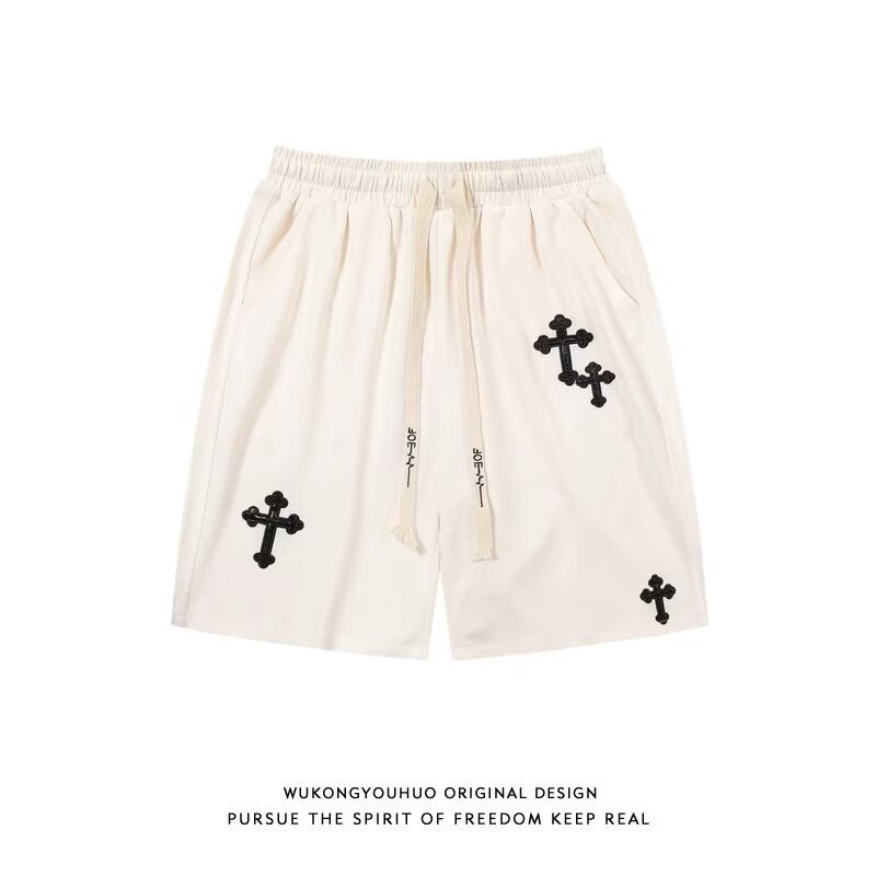 Ropa de verano pantalones cortos casuales masculinos de la marca de moda INS explosivos tendencia de ocio relajado pantalones medianos fuera de la versión coreana de pantalones de cinco puntos