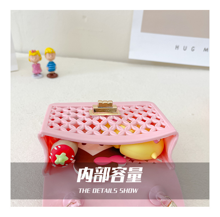 Fashion Solid Color Hollowed Children's Jelly Messenger Bag 12*9*5cm display picture 5