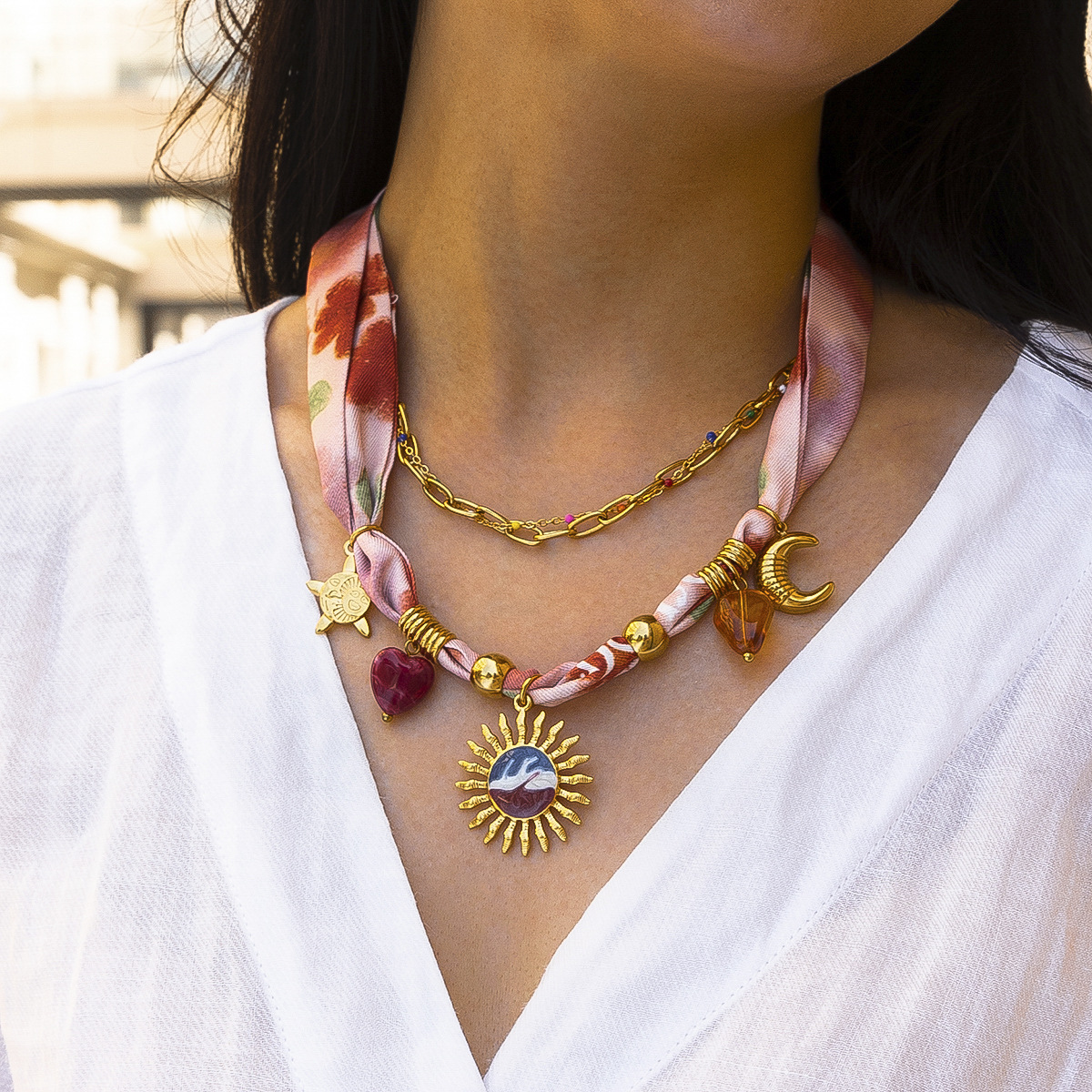 TENA Europa y América collar colgante de sol de acero inoxidable ligero lujo nicho collar de cuerda trenzada rosa acero titanio no decoloración joyería