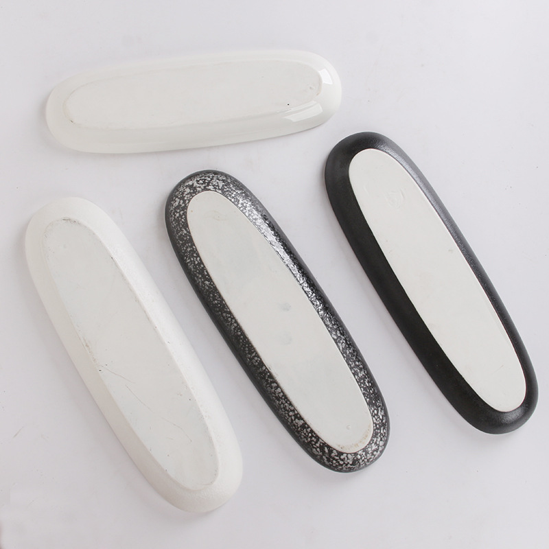 Plato de cerámica negro blanco ovalado rectangular de estilo japonés plato doméstico plato de sushi de restaurante japonés plato de ensalada plato frío