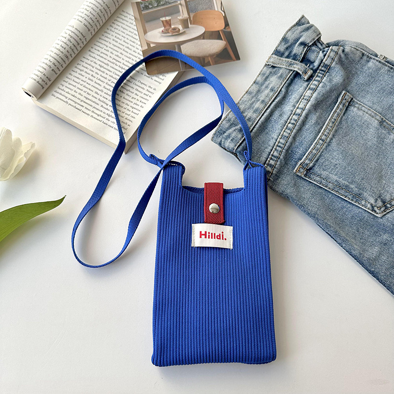 Primavera nuevo color sólido de punto de hombro mochila bolso móvil de moda versátil bolso de dopamina para hombres y mujeres