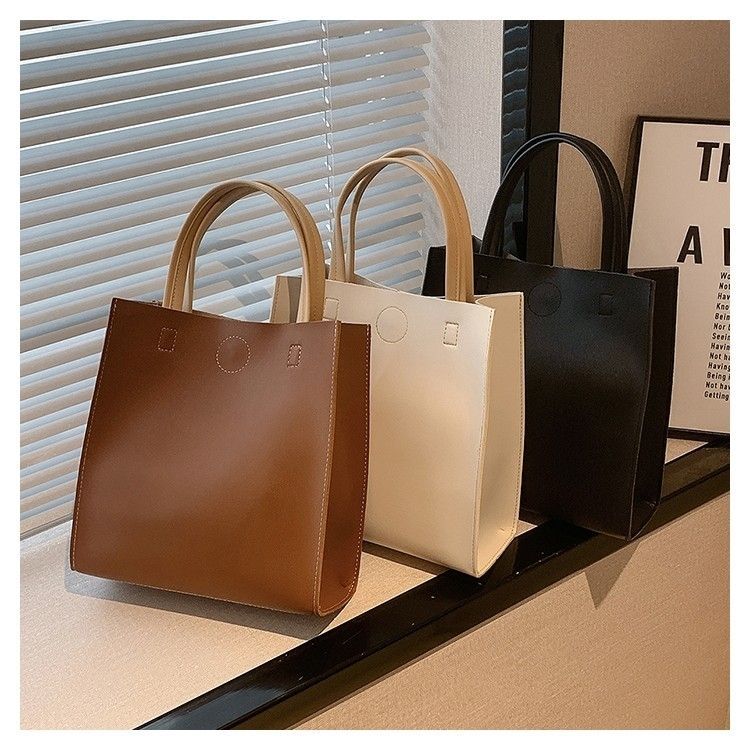 2024 New Bags Korean Version Versatile Commuting Bags Large Capacity Portable Tote Bag Temperament Popular Women’s Bag Vertical Style_voghion.com