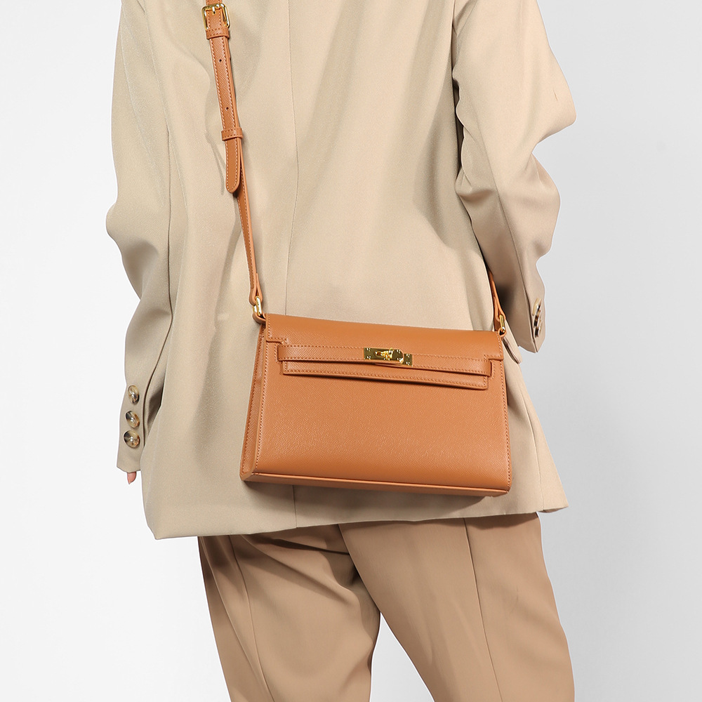 El nuevo bolso Kelly en otoño e invierno de 2024 está lleno de bolsos para mujeres con un solo hombro y axilas, y el diseño de nicho es un bolso de palo de textura avanzada.