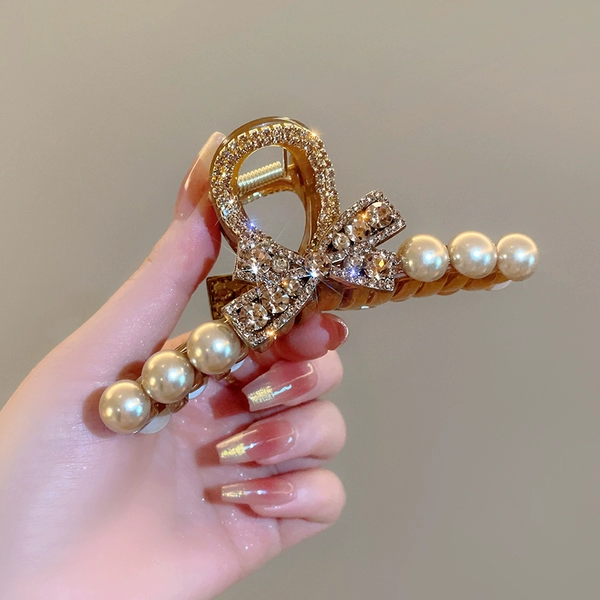 Crab pin with bow, champagne color
