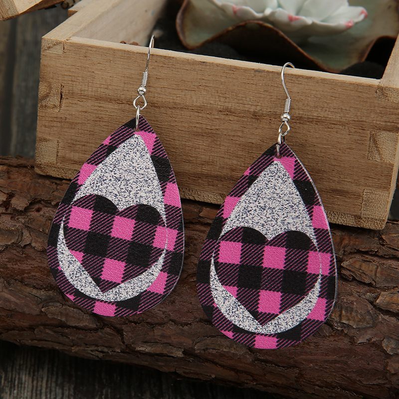 New Pink Black Grid Silver Sequined Leather Earrings Peach Heart Hollow Earrings Wholesale display picture 3