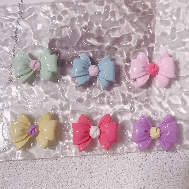 Nuevos accesorios de resina de color macaron de lazo de dibujos animados