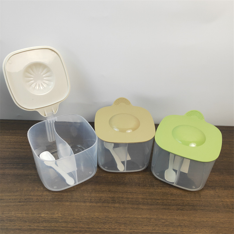 Venta al por mayor caja de condimento de dos rejillas transparente para el hogar Cocina cocina sal MSG caja de condimento 2 yuanes tienda departamental condimento caja