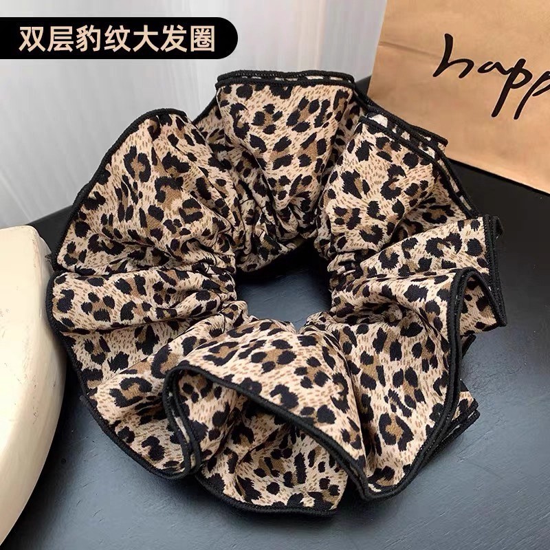 Otoño y invierno de 2025 nuevo anillo de pelo de leopardo de alta elasticidad, bolas de cabello, cuerdas de cabello sueltas, correa de goma grande