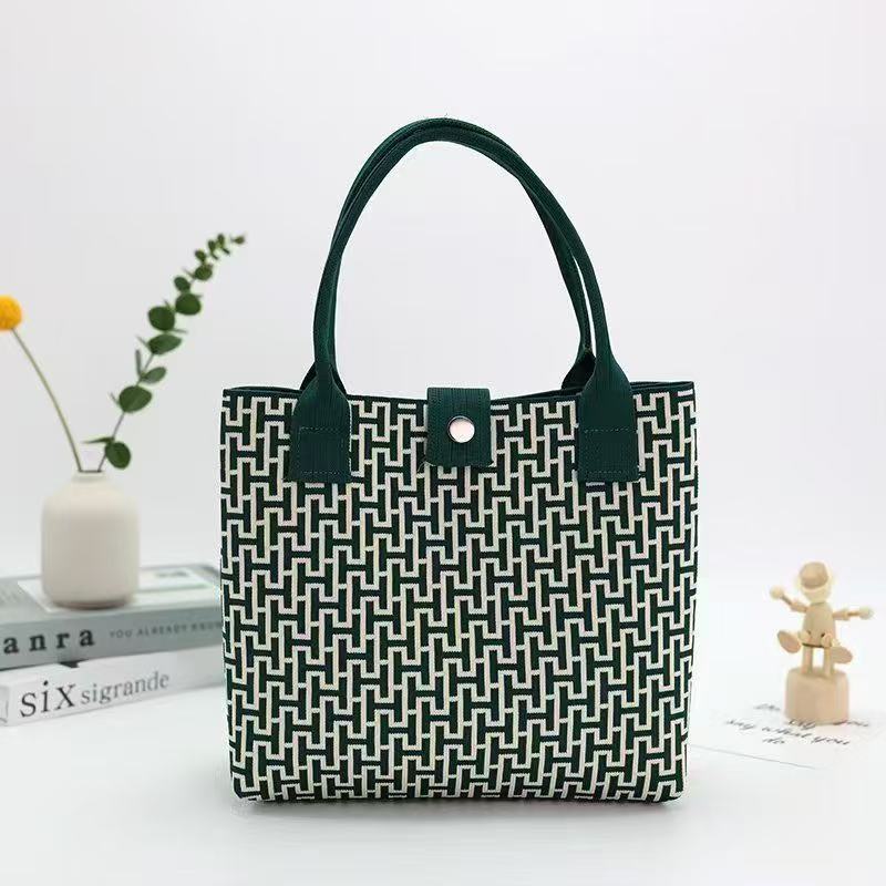 Japón y Corea del Sur tejido bolsas de mano bolsas de viaje de gran capacidad bolsas de compras de chicas fabricantes de bolsas H al por mayor