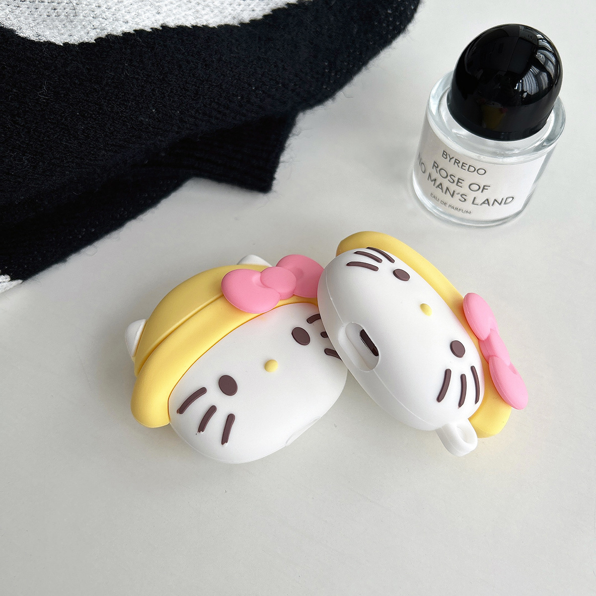 Personalidad de dibujos animados sombrero amarillo kt gatos Apple AirPods 1 / 2 auriculares Bluetooth pro cubierta 3 para silicona suave