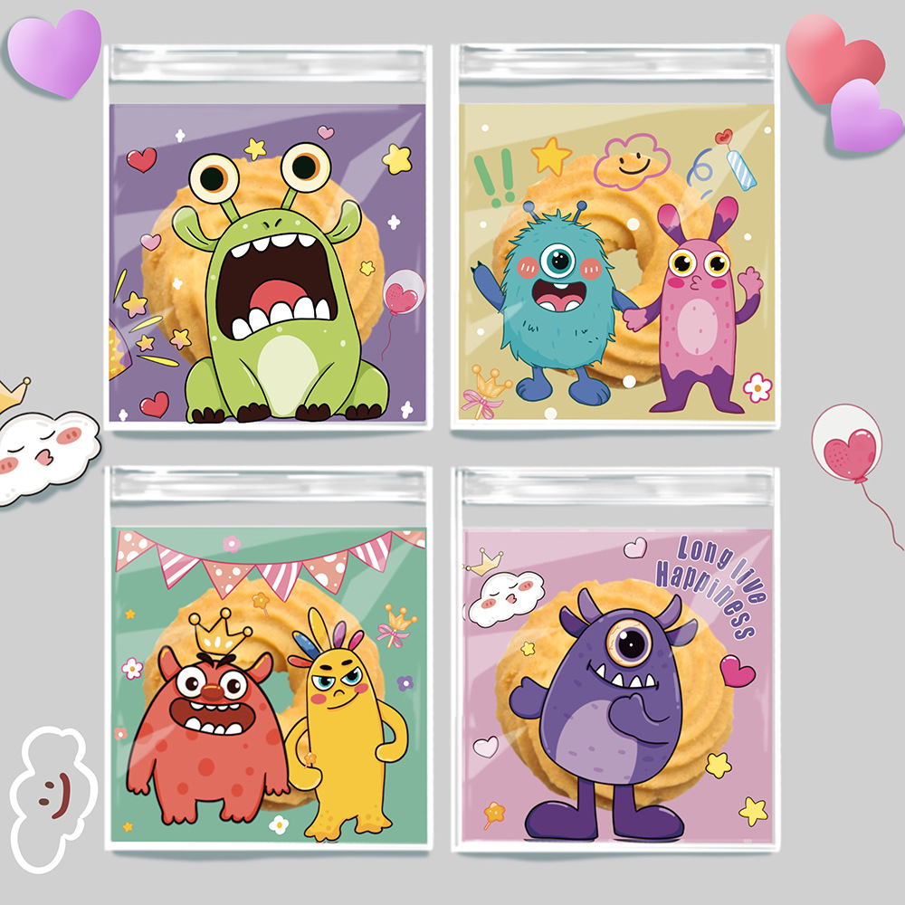 新款100个装快乐怪兽系列opp自粘袋生日派对糖果巧克力自封包装袋