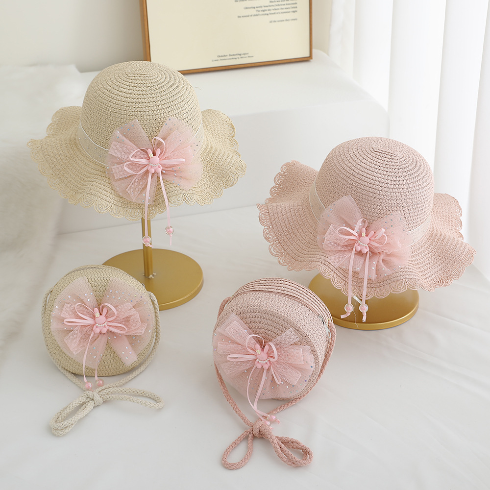 Verano nuevo sombrero para niños sombreado sombrero de paja bolso de dos piezas lindo encaje flor niña sombrero de playa al por mayor