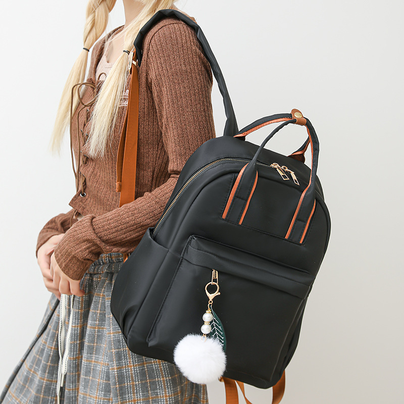 Mochila multiusos de gran capacidad para viajeros, nueva moda de color sólido, mochila de tela Oxford simple y versátil, viaje de gran capacidad