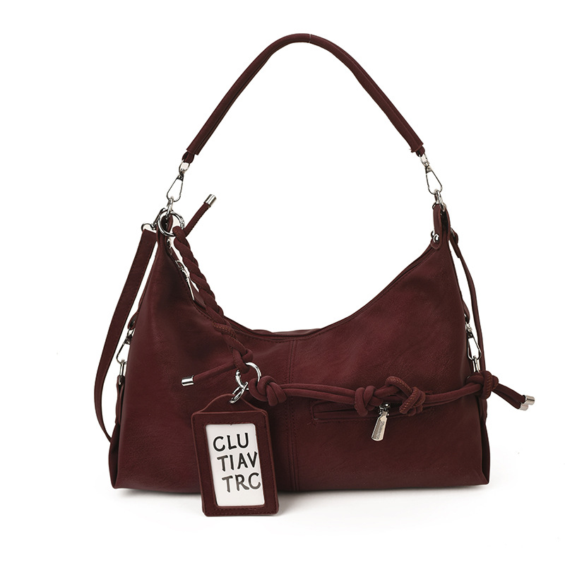 Bolsa de viaje transfronteriza de gran capacidad para mujeres 2025 nuevo estilo coreano de hombro casual bolso de brazo de alto nivel sensación de mochila