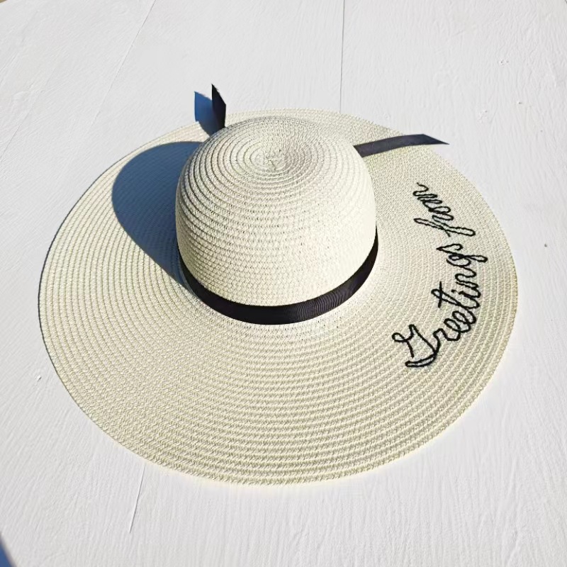 Women's Casual Simple Style Letter Daisy Embroidery Wide Eaves Straw Hat display picture 9