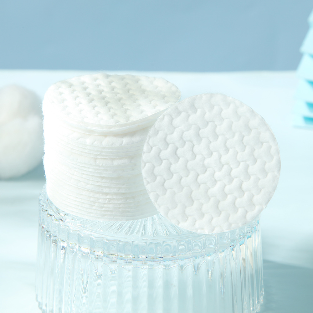 Algodón redondo a granel de suministro directo, algodón cosmético personalizado en relieve, algodón desechable, algodón desmaquillaje, algodón des uñas