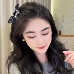 韓国版の新型ヒョウ柄の蝶結びのヘアリング